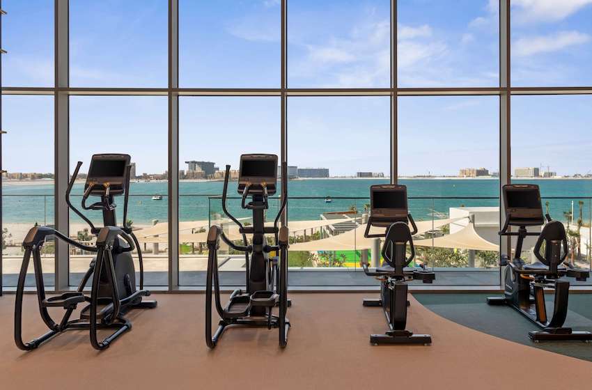 fitness room with sea view SO ras al khaimah resort
