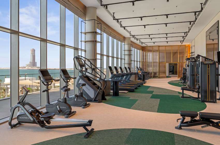 fitness room with sea view SO ras al khaimah resort